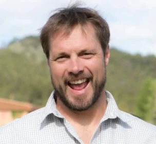 A man smiling.