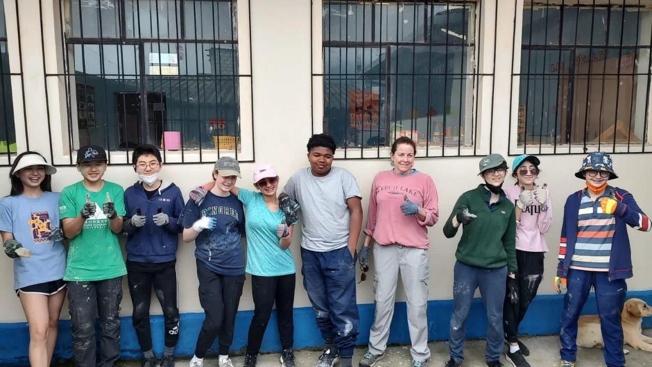 A group of students working on community service.
