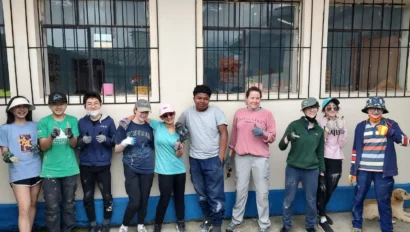 A group of students working on community service.
