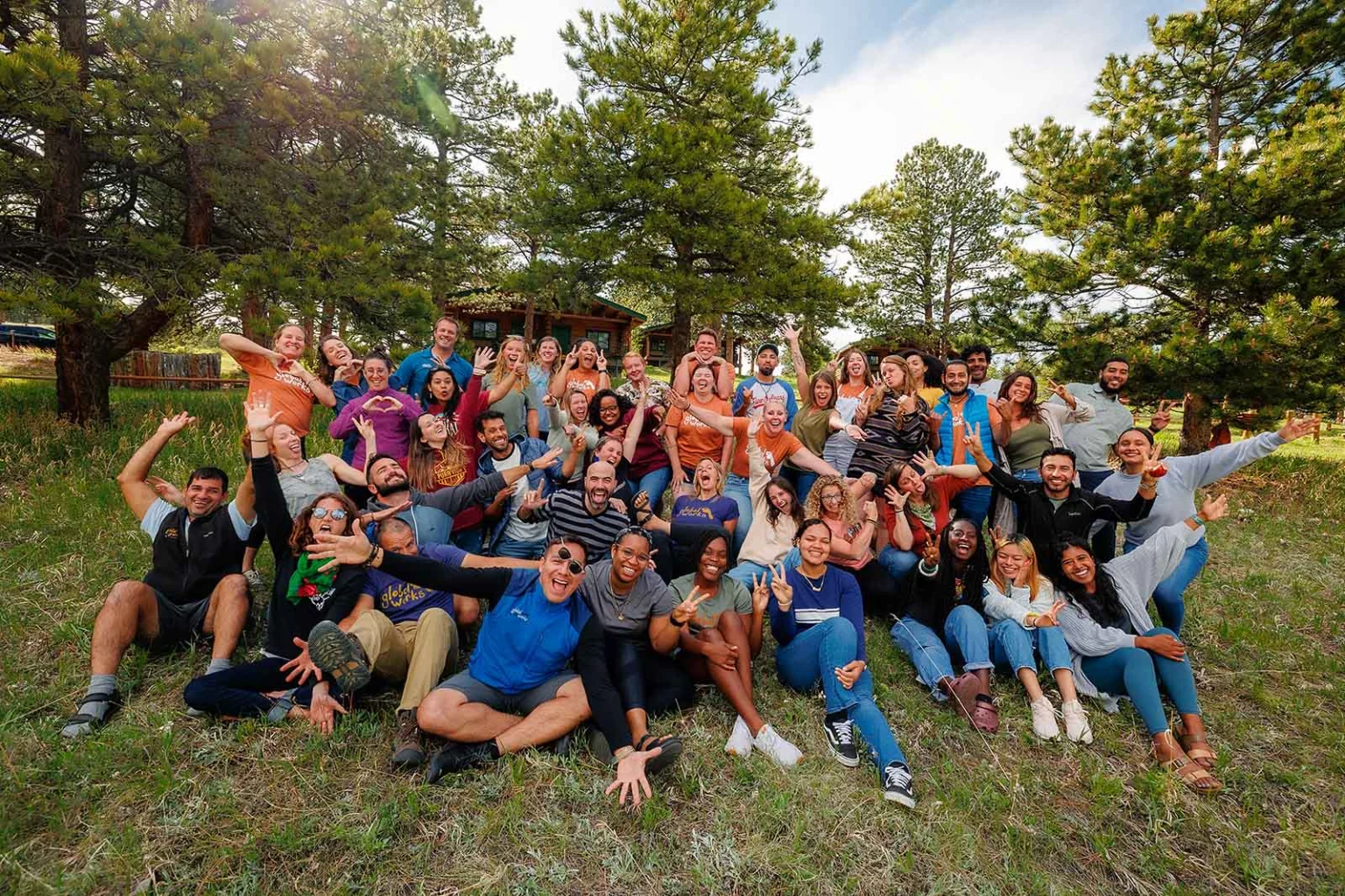 Global Works trip leaders gathered together outdoors.